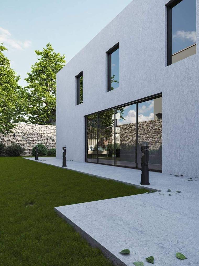 Maison contemporaine blanche équipée de larges menuiseries aluminium